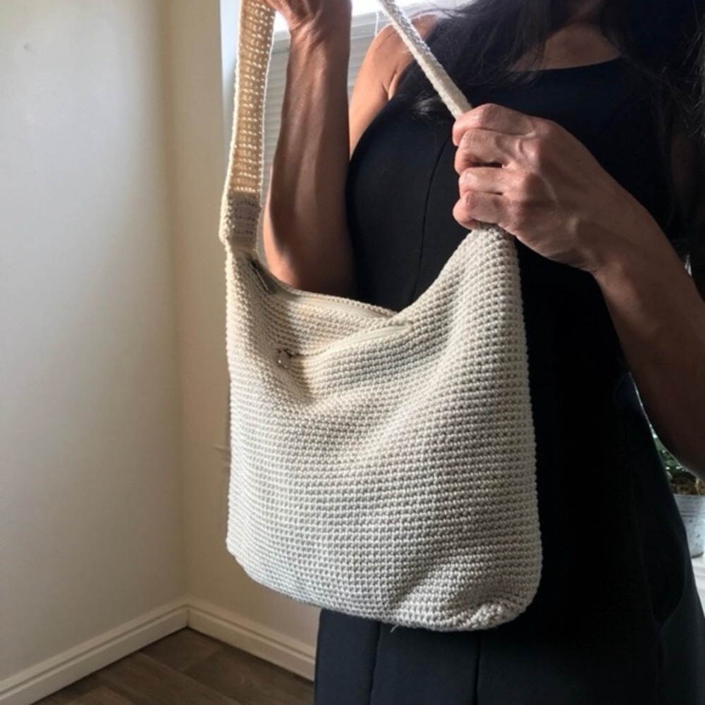 • like new the sak bucket bag with leather charm •